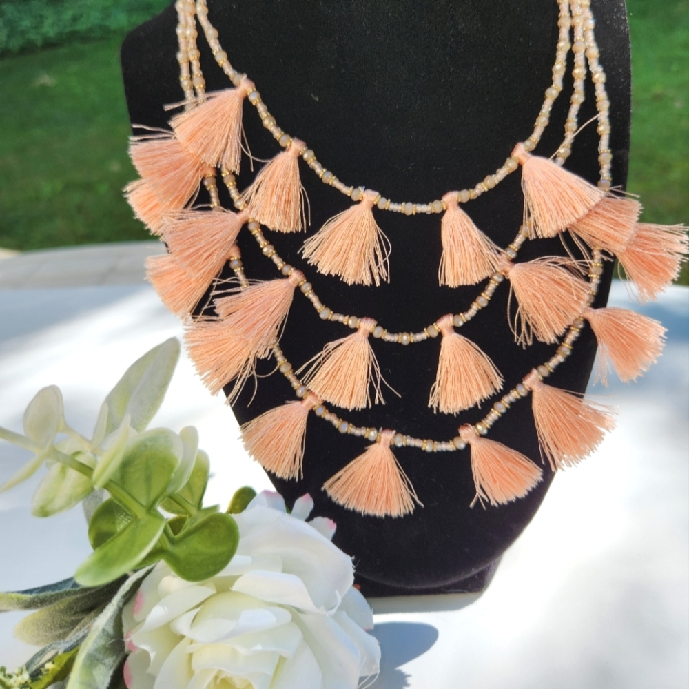 NWT Neiman Marcus three tiered Peach/crystal/gold necklace